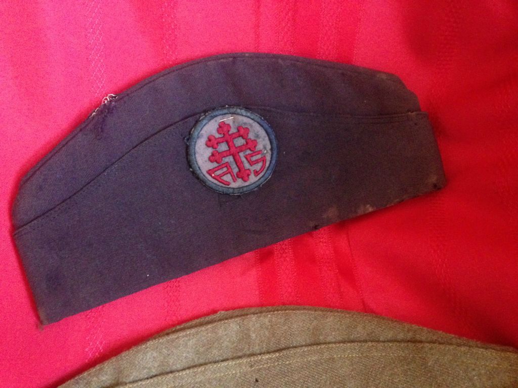 Caps worn by Agnes Swift during her military service in France. The Advance Sector patch was not worn on the cap (but was just pinned to it to keep these mementos together.)