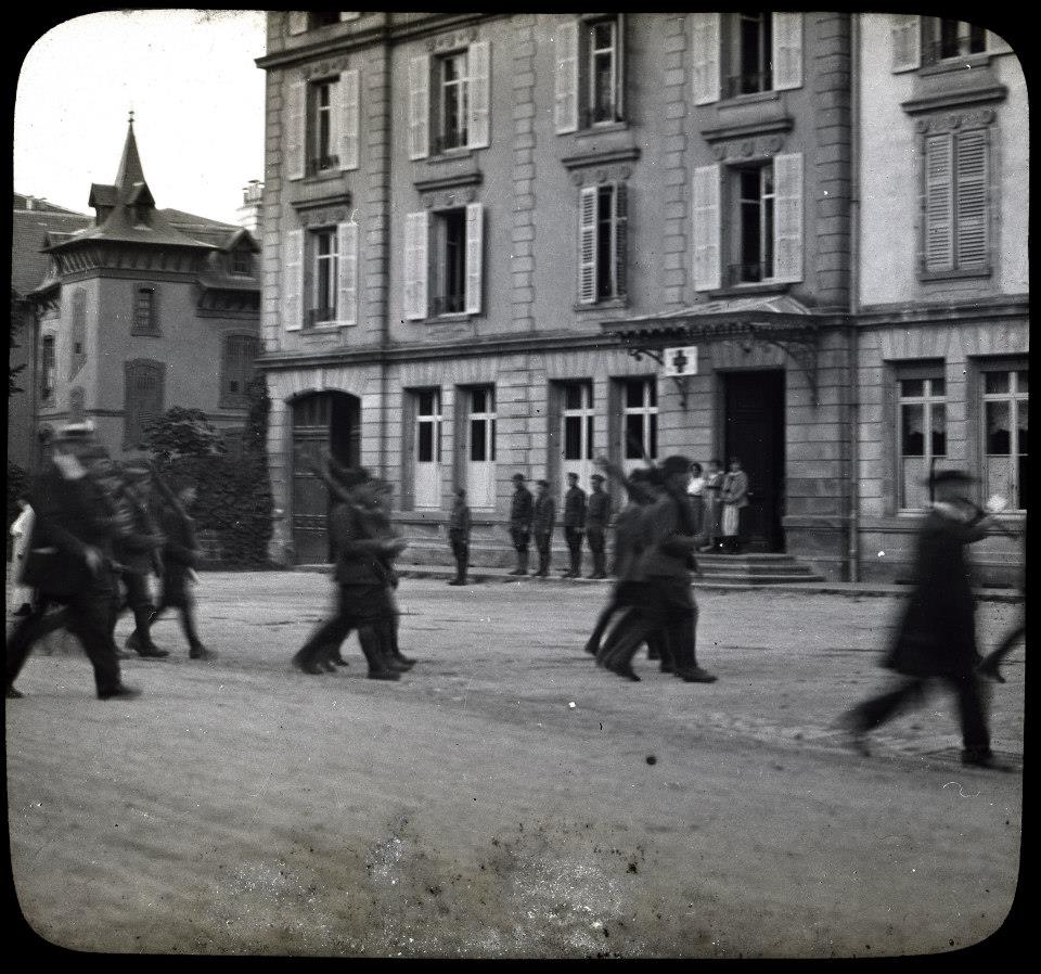 Soldiers marching past  Hotel Martin Aîné, Contrexeville