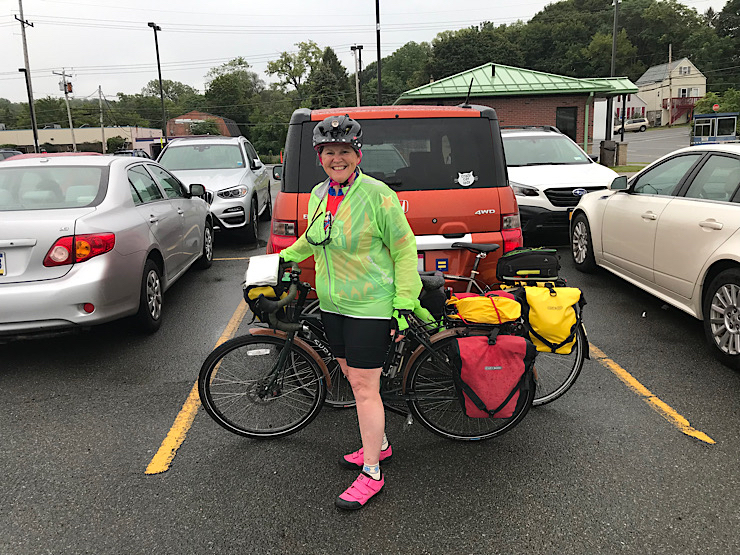 Molly at bike trip end point in Rensselaer's Amtrak parking lot