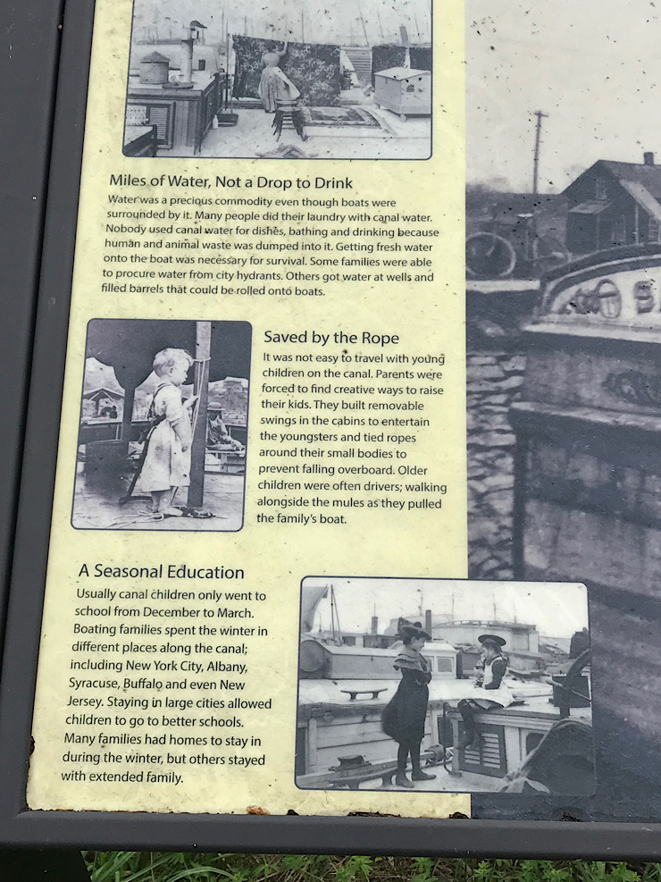 detail of sign about raising a family on the canal boat