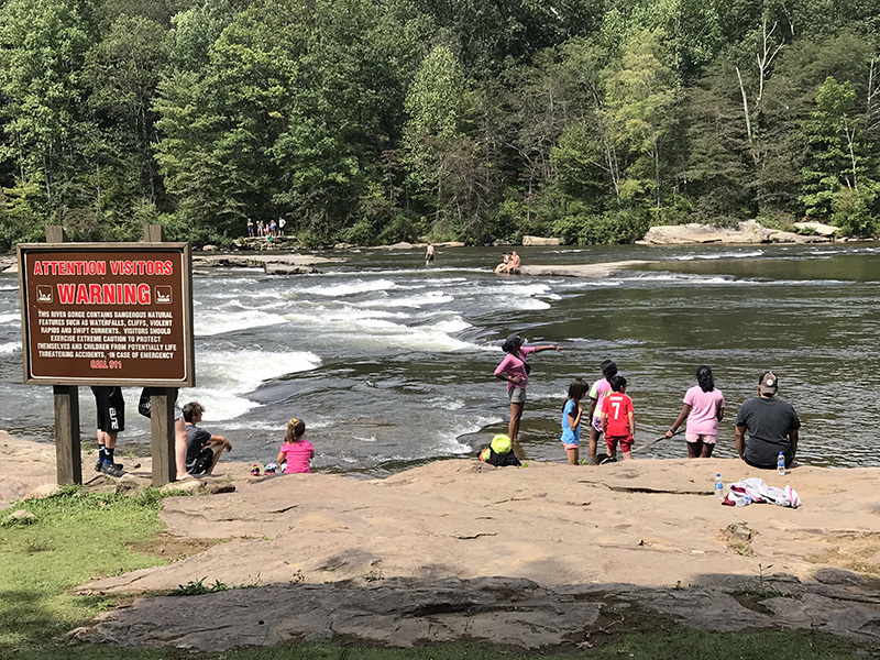 People enjoying the river at Ohiopyle