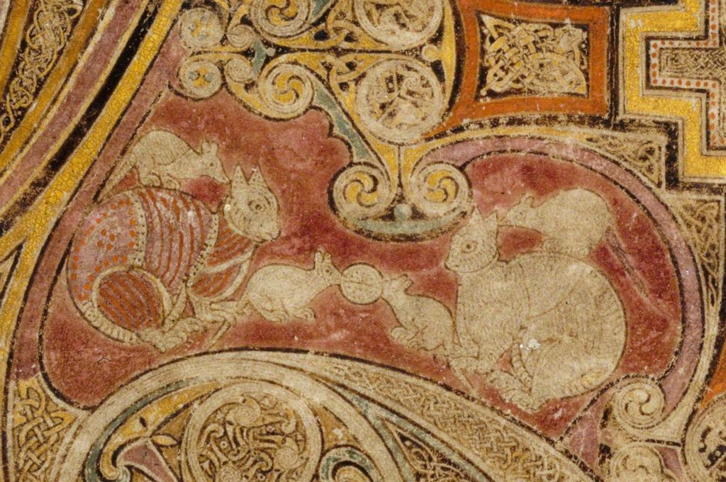 I was tickled to learn that cats and mice appear in the Book of Kells. In this image, two mice are playing tug-of-war with a Eucharist (!) while two cats watch (!!) and two mice sit on their backs (!!!)