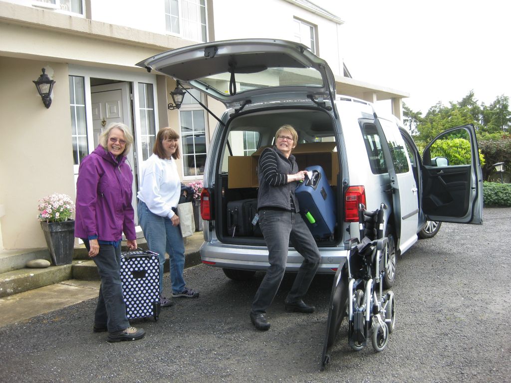 Sara wrangles the luggage, and we're grateful for the sizable area in the VW Caddy Maxi.