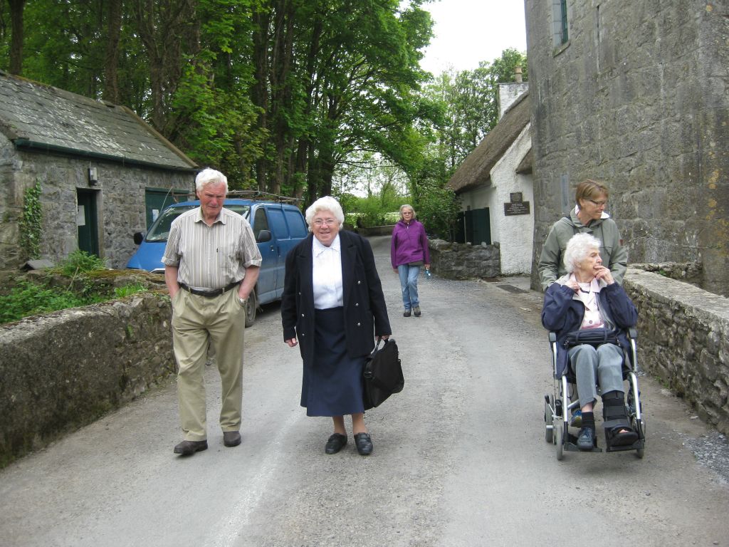 Sister DeLourdes, of the Sisters of Mercy Convent in Gort, Ireland, walks with Mattie Farrell (left) and my sister Annis down the lane at Thor Ballylee, the ancient tower which was once home to poet W.B. Yeats.