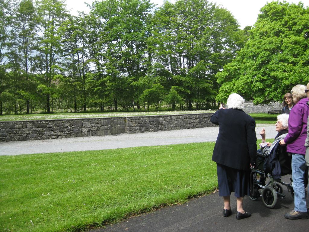 Sister DeLourdes indicating the site where the house of Coole Park once stood (all that remains today is the foundation.) It was razed in 1941, after the death of Lady Gregory. Though all agreed it was a great loss, no one had the means at the time to save it.