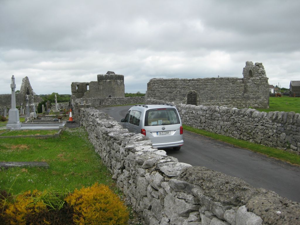 Mom was able to see the Kilmacduagh site from the car, but maybe we should have made her get out of the car. Legend holds that a cure for a backache is to lie on the grave of St. Colman, which is behind the cathedral ruins on this site.