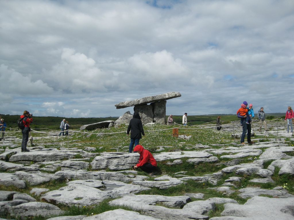 The Poulnbrone megalithic tomb is one of more than 90 megalithic tombs which survive in the Burren and is probably the best preserved. Archeologists have dated its origins to between 4200 BC and 2900 BC. The remains of 33 persons were found beneath it.