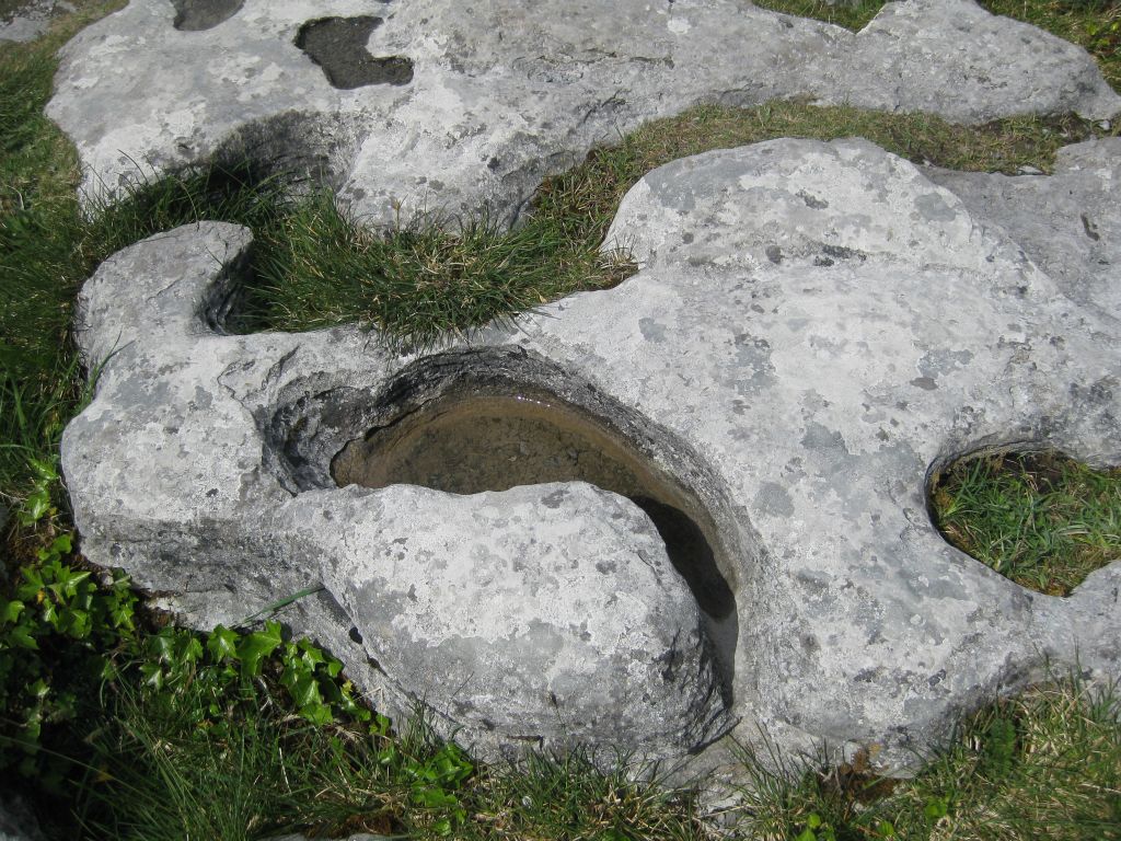Geologic "pools" are etched in the limestone by slightly acidic rainwater. These are known as karmenitza.