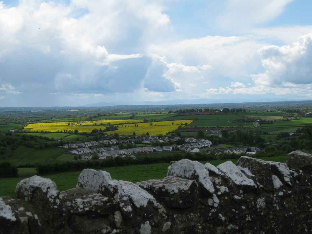 Sunday morning, the view from the Hill of Slane is spectacular with the golden fields of rapeseed in bloom. The mountains in the distance are the Wicklow or Dublin Mountains.