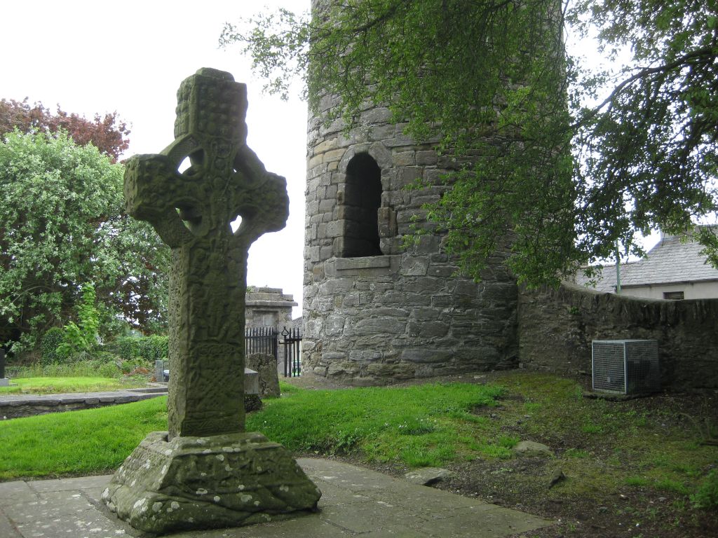 The Cross of St. Patrick and St. Columba, one of the high crosses at Kells. This one stands beside the round tower built in the 9th Century.
