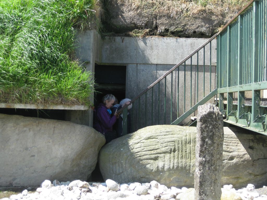 Roberta, climbing up the steps to exit the passage at Knowth.