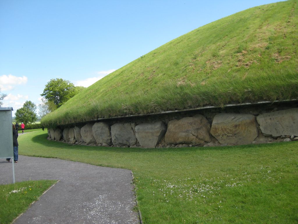 The mound at Knowth has been fully restored. Kerbstones were replaced beneath a supporting (modern) concrete shelf, and in some cases, missing stones were replaced with similar stones but very clearly marked as "new" stones.