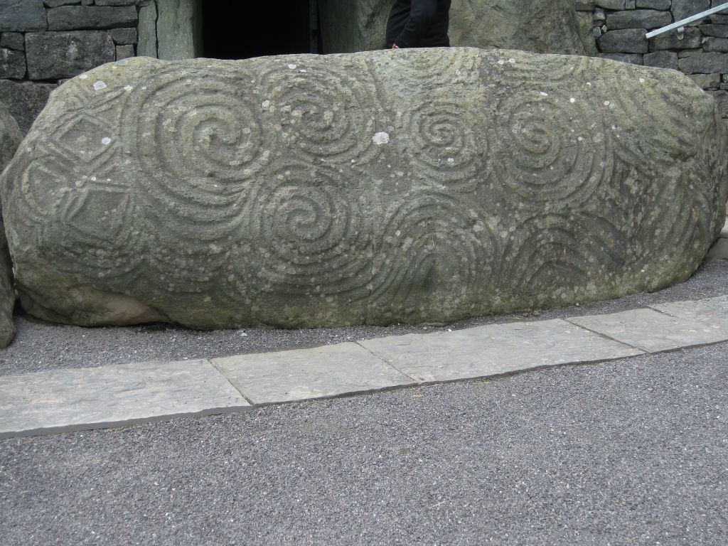 The entrance stone at Newgrange is etched with triskeles, triple spirals.